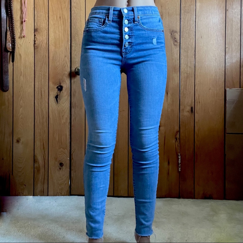 High rise “true skinny” medium wash jeans